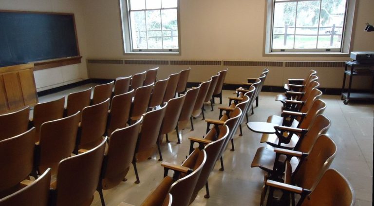 students asking questions in a classroom